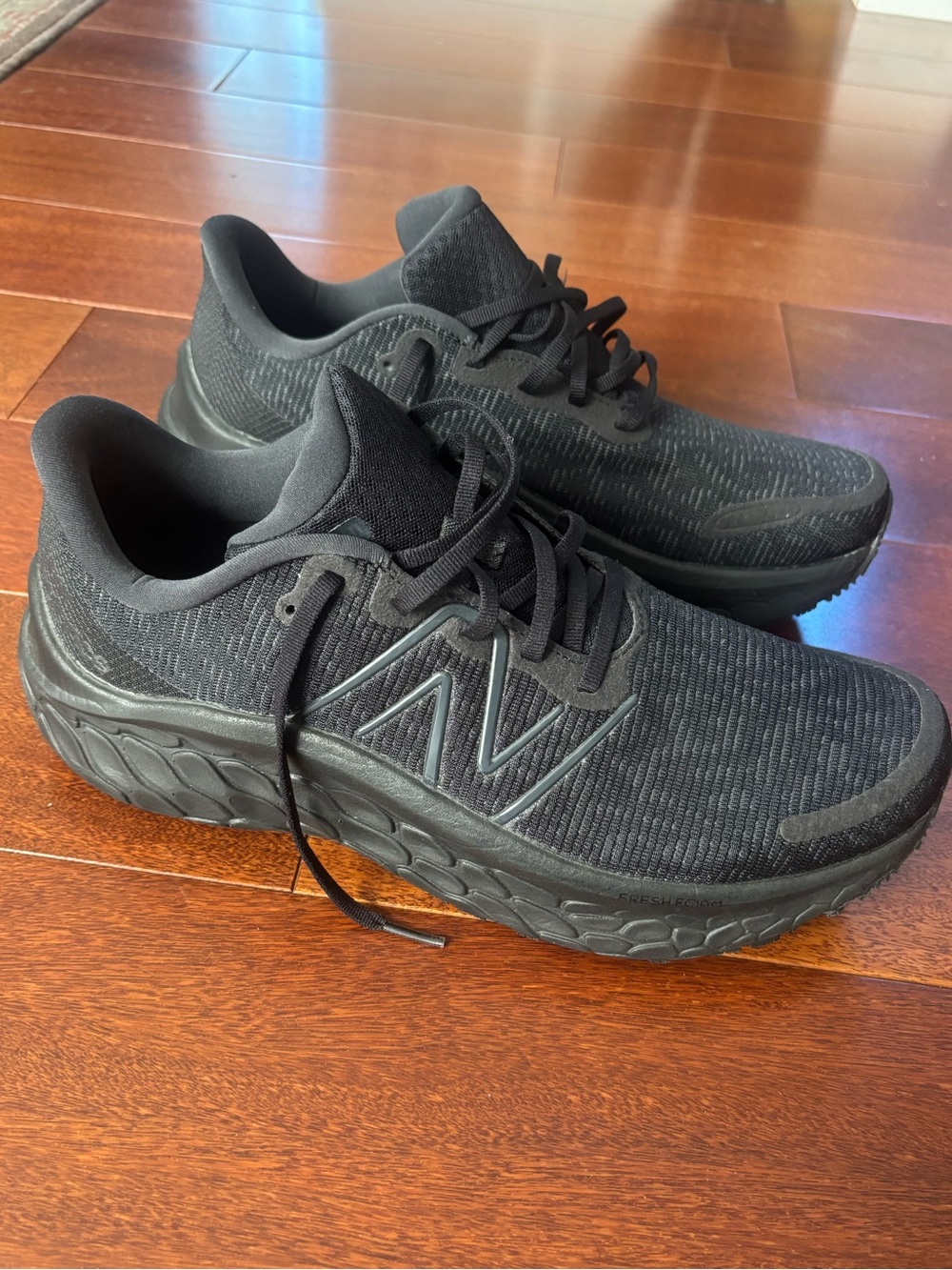 New Balance Men's Black Athletic Sneakers